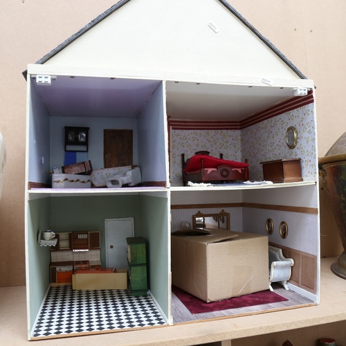 888 - A large Vintage doll's house with some furniture and fittings, height 68cm