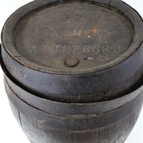 889 - A black painted coopered oak Whisky barrel, for Gaymers of Attleboro, height 43cm