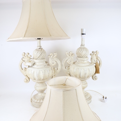 928 - A large pair of painted and distressed resin urn lamps and shades, height excluding fitting 52cm