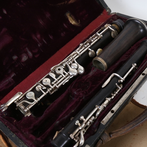 930 - An Antique rosewood 3-piece oboe, by J Pontier of Paris, in original fitted case