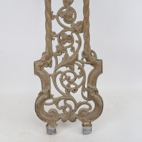 939 - A large gilded cast-iron gate bracket/stand, overall length 90cm