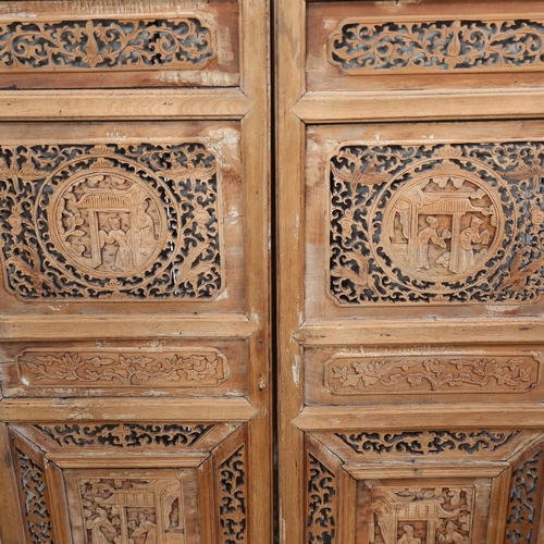 988 - A large carved and pierced Chinese door set and frieze, door height 101cm (3)