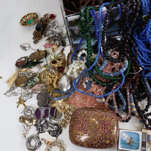 1209 - A large quantity of various costume jewellery, bead necklaces, brooches etc (3 boxes)