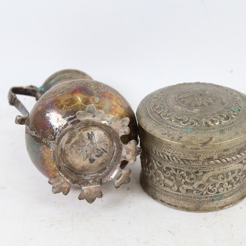 1219 - An Eastern unmarked white metal teapot, and a box and cover (2)