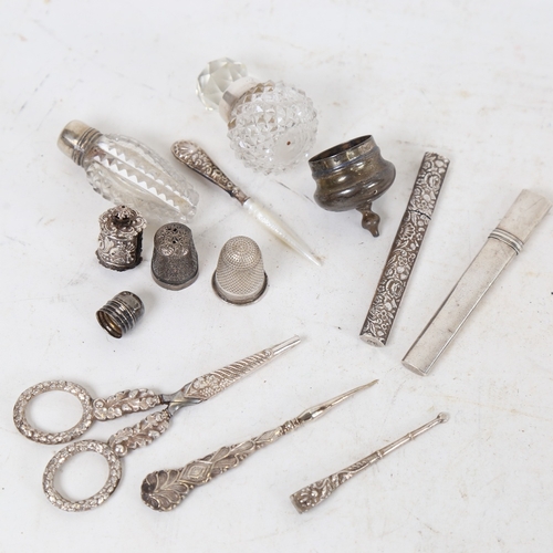 1288 - A group of Antique unmarked silver sewing items, including novelty tape measure, scissors, jars etc