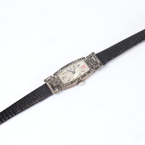 1294 - An early 20th century lady's silver-cased mechanical wristwatch, paste set bezel, not currently work... 