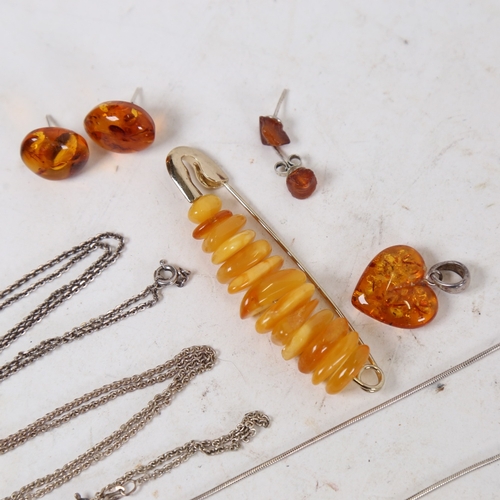 1323 - Various amber jewellery, including Baltic amber pendants, earrings, brooch etc