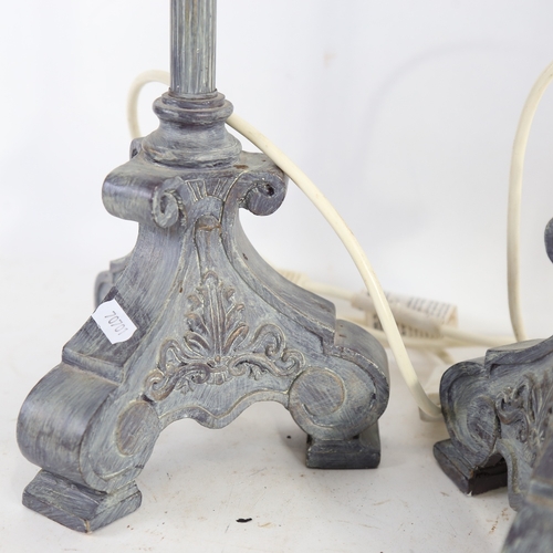 324 - A graduated pair of distressed resin Corinthian column table lamps, largest height excluding fitting... 