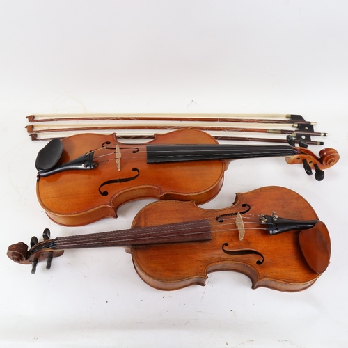 891 - A 20th century violin, and a viola, with 3 bows, in double instrument hardshell case