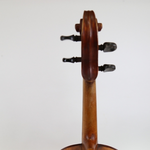 891 - A 20th century violin, and a viola, with 3 bows, in double instrument hardshell case