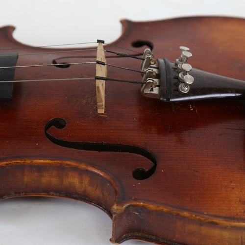 892 - A 20th century half-size violin, with 2 bows, and hardshell carrying case