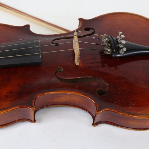 894 - A German violin, by Gerh Reinel, with bow, in hardshell carrying case