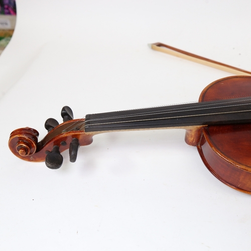 894 - A German violin, by Gerh Reinel, with bow, in hardshell carrying case