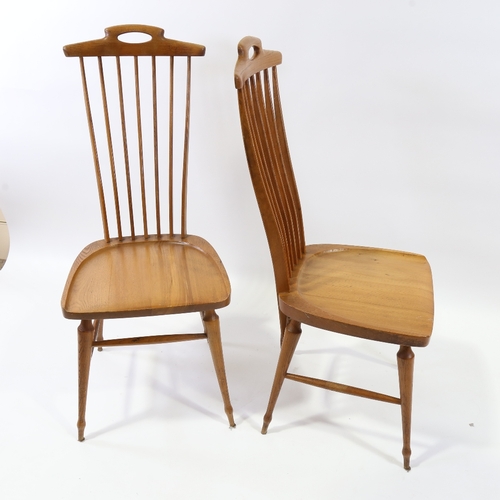 2076 - A pair of 1950s' Danish chairs, with blade form spindles, sculpted top rail and solid seat, height 1... 