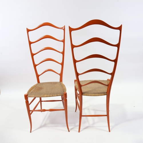 2081 - CHIAVARI, Italy,  A pair of exaggerated high ladder back chairs, in sculpted wood in the manner of G... 