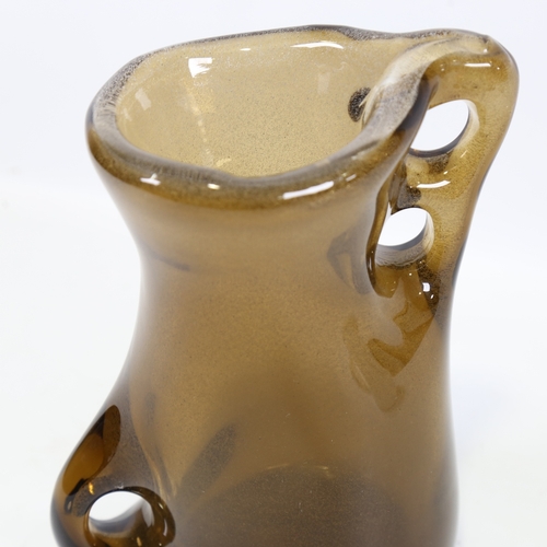 2095 - A mid-century Italian free-form blown glass vase in the manner of a AVEM, brown body with bubble inc... 