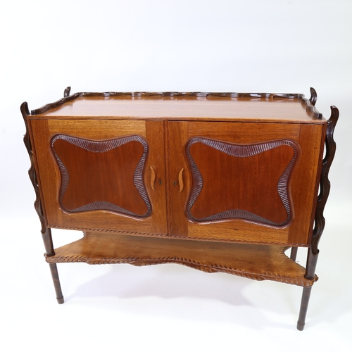 2100 - HILLE OF LONDON, a unique mid-century sideboard in the Afro-Italian taste, mahogany cabinet on carve... 