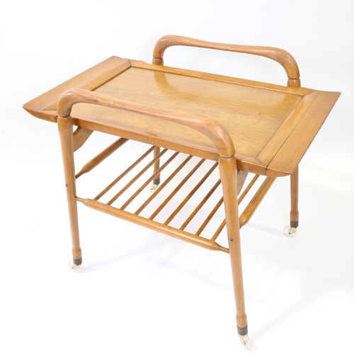 2101 - A mid-century Italian tray top trolley in the manner of ICO PARISI, height 74cm