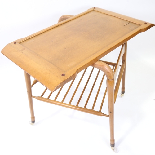 2101 - A mid-century Italian tray top trolley in the manner of ICO PARISI, height 74cm