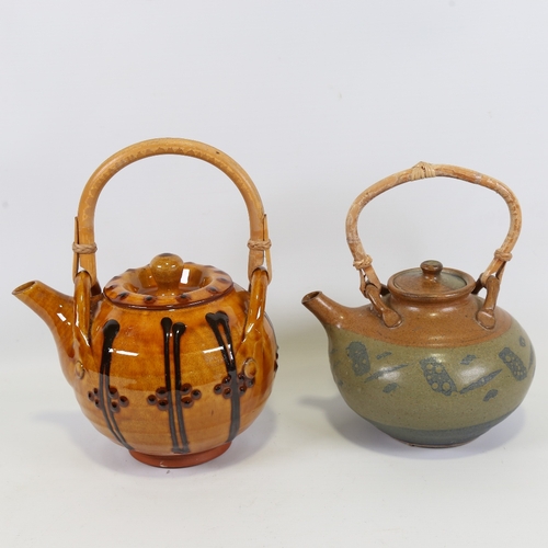 2135 - 2 studio pottery cane handle teapots, Isle of Wight and slipware in manner of John Pollex