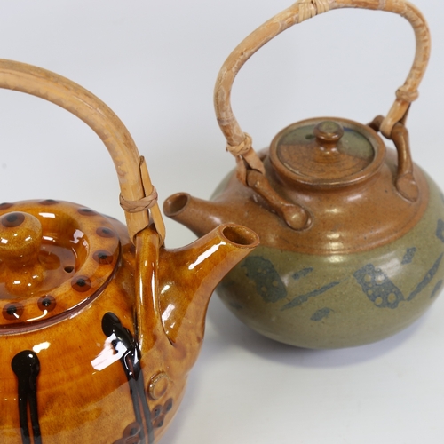 2135 - 2 studio pottery cane handle teapots, Isle of Wight and slipware in manner of John Pollex