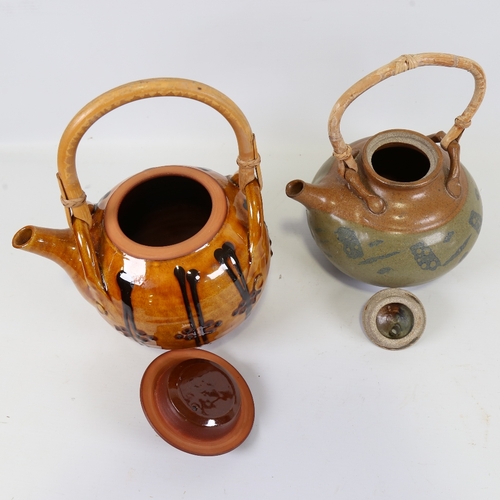 2135 - 2 studio pottery cane handle teapots, Isle of Wight and slipware in manner of John Pollex