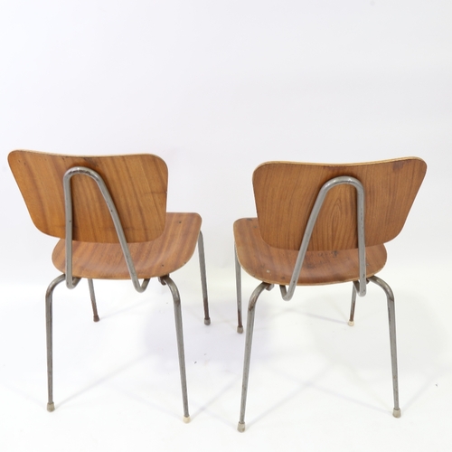 2151 - A pair of 1950s' steel frame and bent plywood chairs, possibly MH Stalmobler, stamp to underside