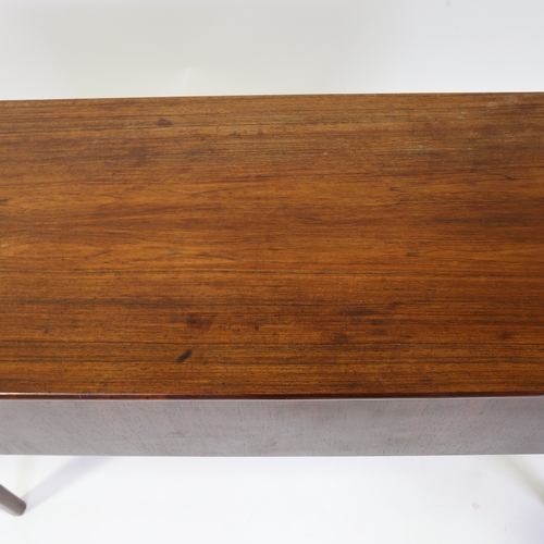 2166 - FRODE HOLM for Illums Bolighus, Denmark, a rosewood lowboard / console, makers plaque to underside, ... 