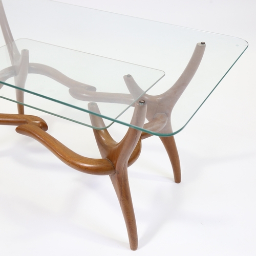 2009 - A mid-century Italian 2 tier glass coffee with organic sculptural base in walnut in the manner of PI... 