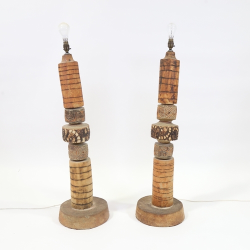 2015 - BERNARD ROOKE (1938) - A pair of 1970s brutalist stoneware 6 section totem lamp bases, both impresse... 