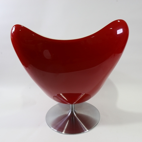 2025 - TERENCE CONRAN, British, Glove Chair, designed 2002,  in red fibreglass and white leather on tilt an... 