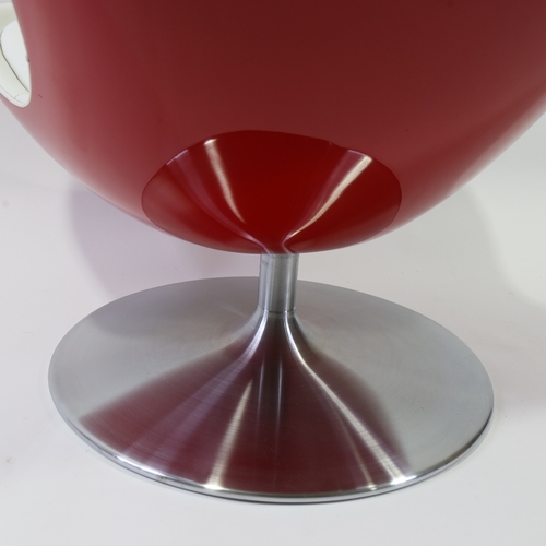 2025 - TERENCE CONRAN, British, Glove Chair, designed 2002,  in red fibreglass and white leather on tilt an... 