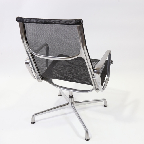 2026 - VITRA EAMES, EA116 Aluminium Group high-back swivel lounge chair, in black mesh, with maker’s labels... 