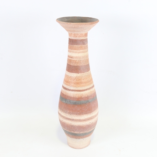 2047 - A large eartenware studio pottery vase with banded and scraffito surface, unsigned, height 44cm