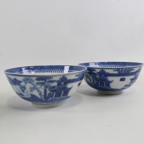 190 - A set of 4 Chinese blue and white porcelain bowls, hand painted pagoda scenes, indistinct marks unde... 