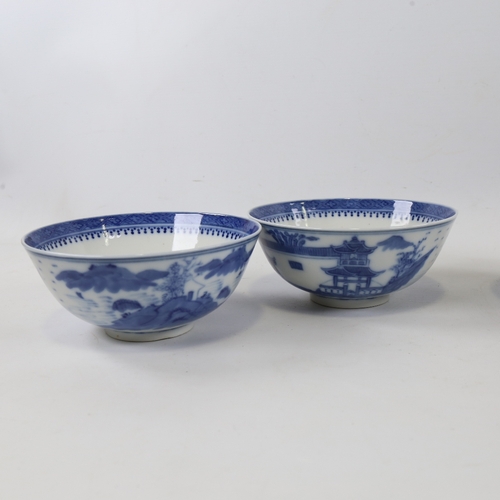 190 - A set of 4 Chinese blue and white porcelain bowls, hand painted pagoda scenes, indistinct marks unde... 