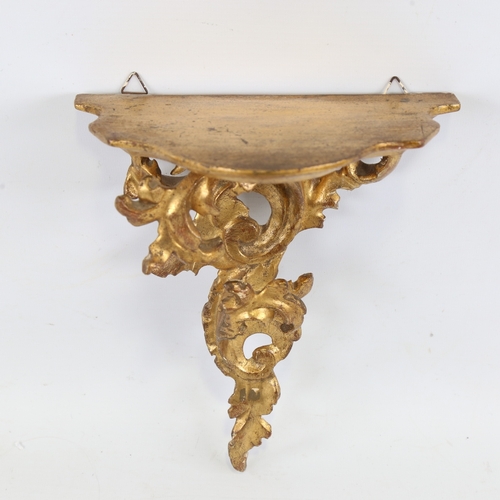 195 - A carved giltwood Florentine shelf bracket with acanthus support, probably early 20th century, heigh... 