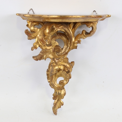 195 - A carved giltwood Florentine shelf bracket with acanthus support, probably early 20th century, heigh... 