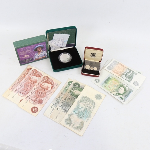 242 - A set of 1975 Maundy money, a Queen Mother Centenary silver Piedfort centenary crown, cased, 28 Mint... 