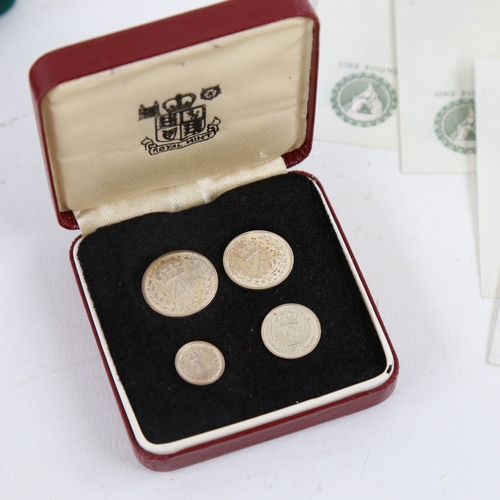 242 - A set of 1975 Maundy money, a Queen Mother Centenary silver Piedfort centenary crown, cased, 28 Mint... 