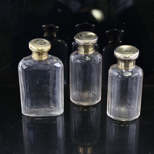 243 - A set of 3 Asprey's cut-glass and silver-gilt topped perfume bottles, hallmarks London 1910, largest... 