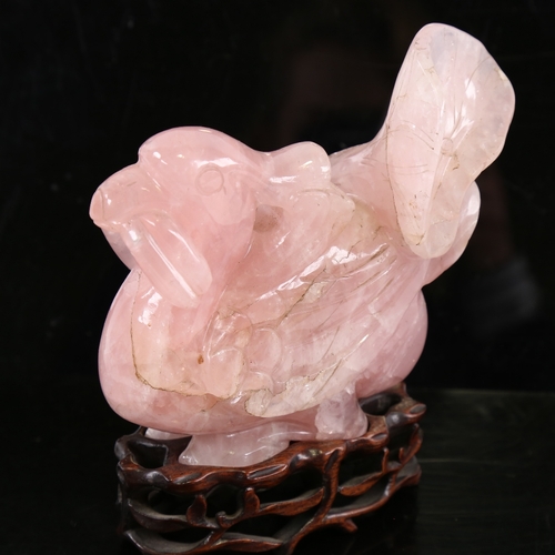 244 - A Chinese carved rose quartz bird on hardwood stand, overall height 16cm