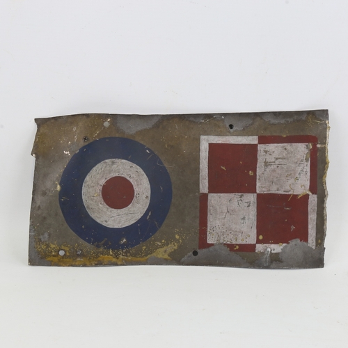 249 - A Vintage metal panel from a British Military aircraft, with painted insignia, 30cm x 15.5cm