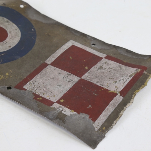 249 - A Vintage metal panel from a British Military aircraft, with painted insignia, 30cm x 15.5cm