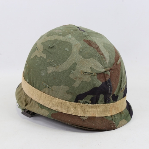 250 - US Army Military helmet, liner dated Oct 1972, with camo cover