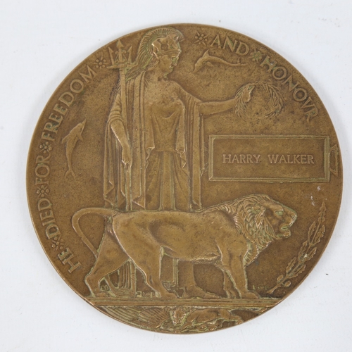 252 - A First World War Period bronze memorial death plaque to Harry Walker