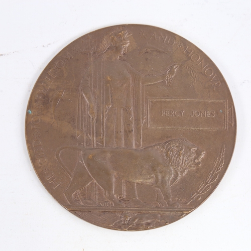 253 - A First World War Period bronze memorial death plaque to Percy Jones