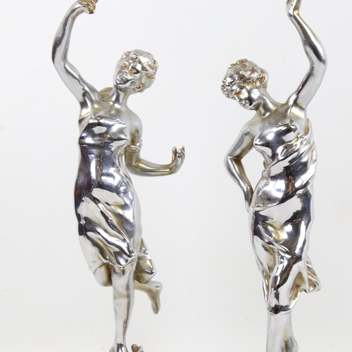 257 - A pair of Art Deco chrome plate spelter dancing girl figures on onyx bases, height 34cm