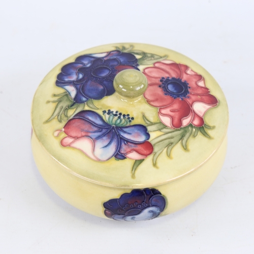 258 - MOORCROFT POTTERY - poppy design bowl and cover, diameter 14cm