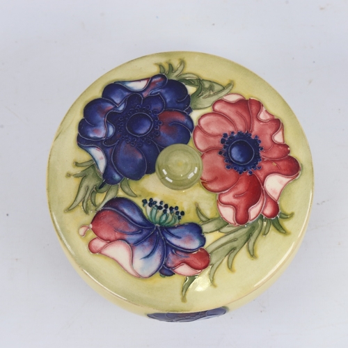 258 - MOORCROFT POTTERY - poppy design bowl and cover, diameter 14cm